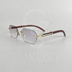 Lunette de soleil percé doré bras bois 64022