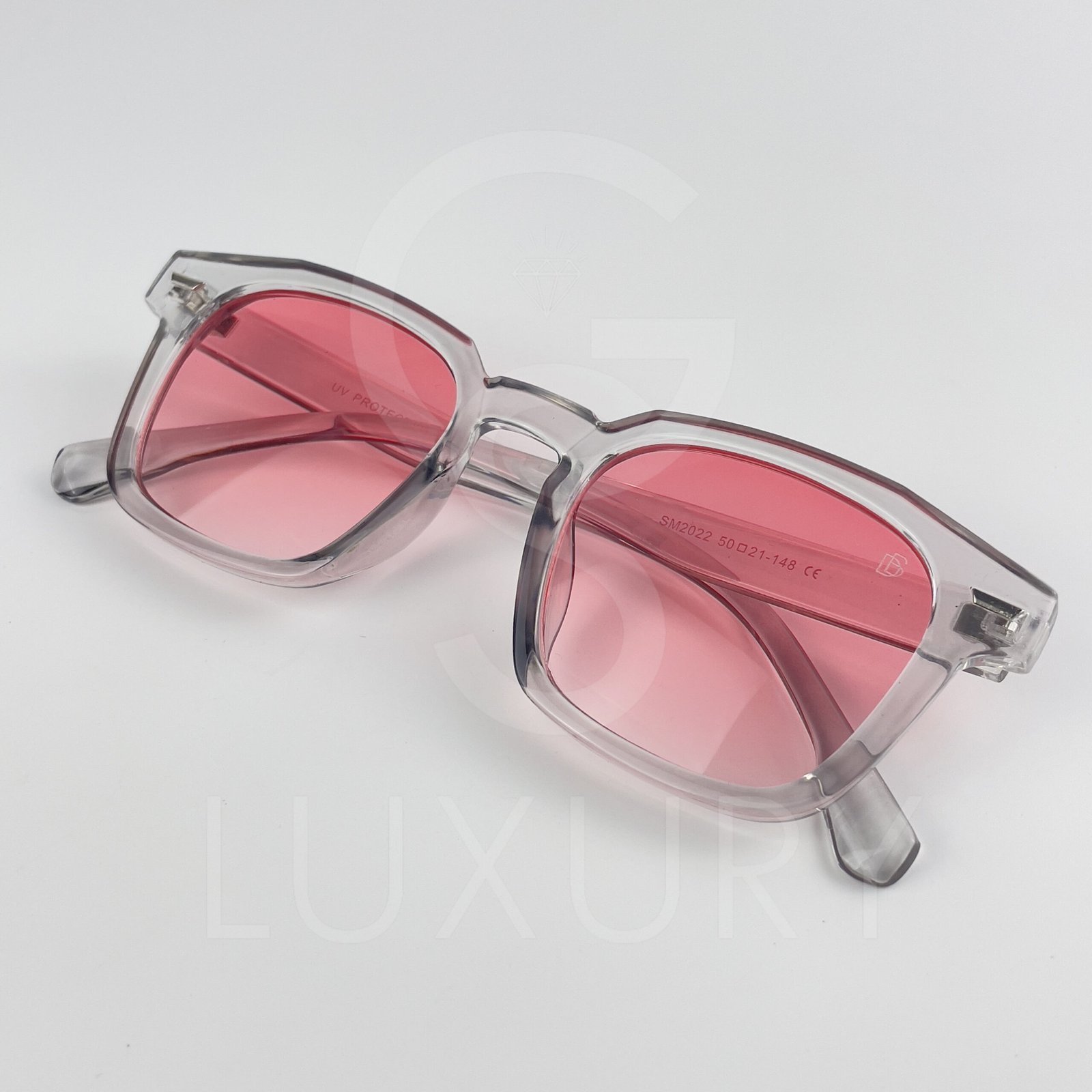Lunette de soleil David beckham Carré Gris Verre Rose SM2022