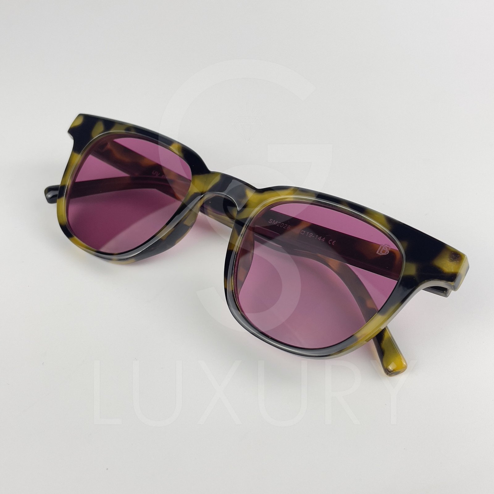 Lunette de soleil David beckham Carré Tigré Verre Mauve SM2028